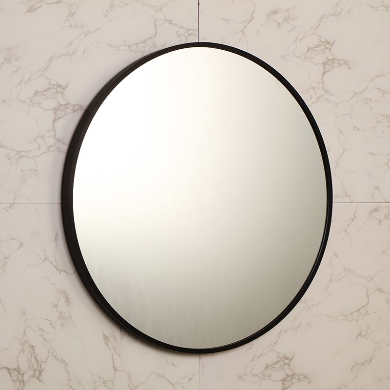 מראה עגולה עם מסגרת זהב